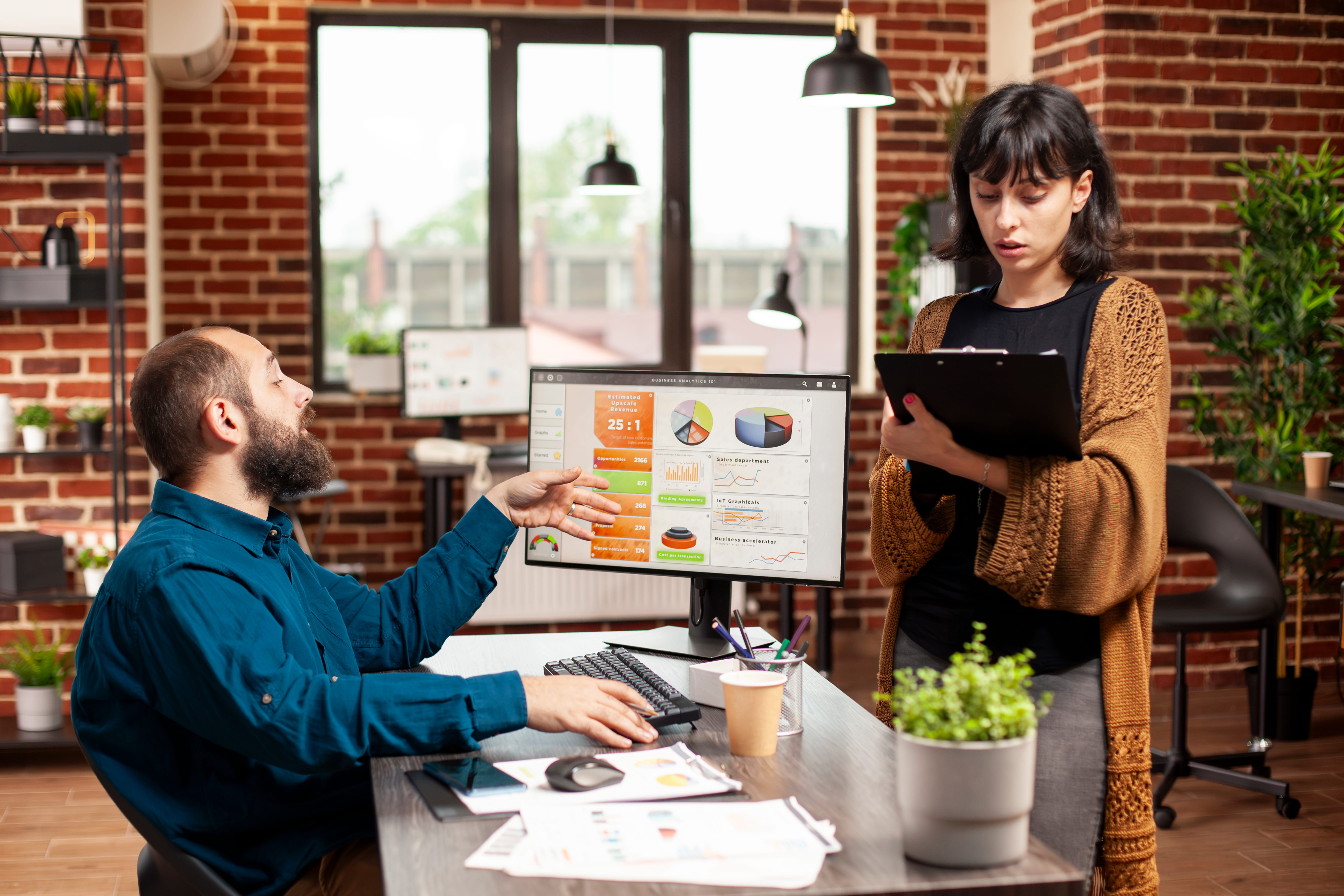 Woman explaining project ideas to a coworker